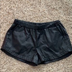 Black pleather elastic waist shorts